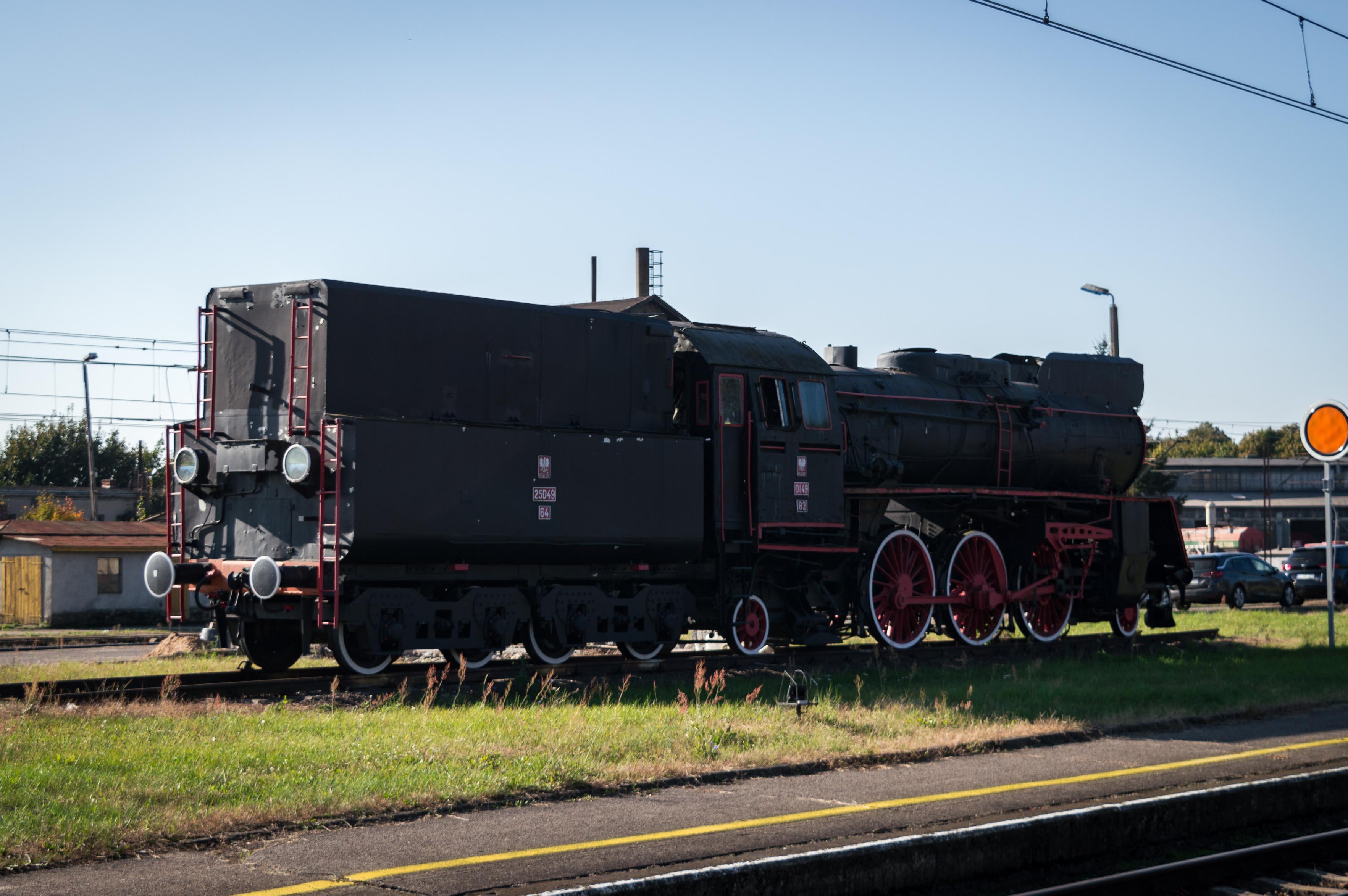 PKP Class Ol49 steam locomotive parked at Krzyż station as a monument