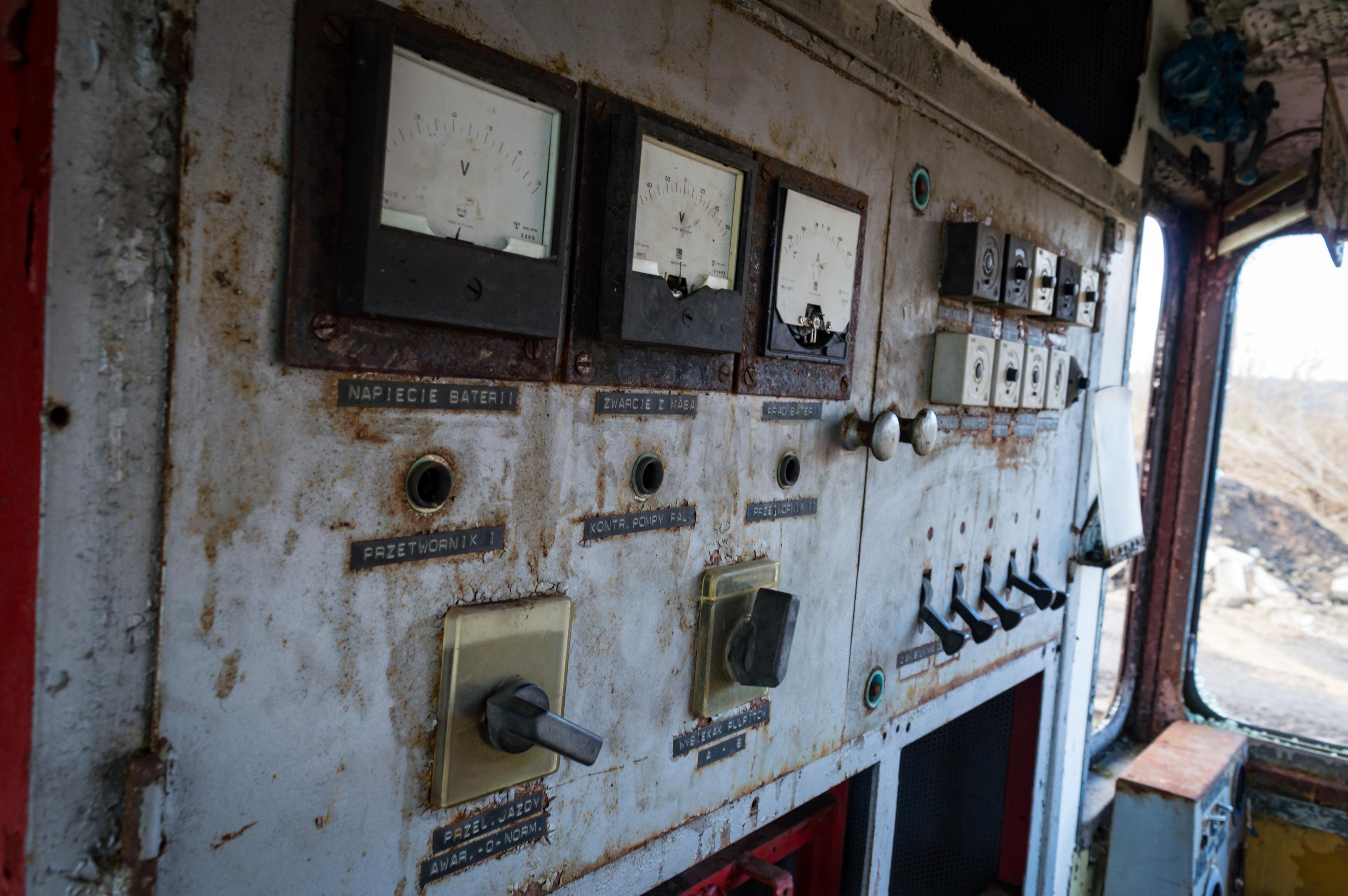 Another shot inside the driver's cabin. Shows a board with switches and analog electric meters